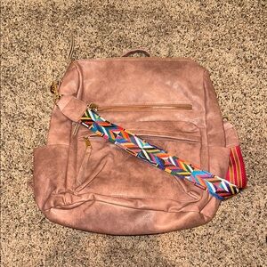 Stylish Pink/Tan Backpack with Colorful Strap
